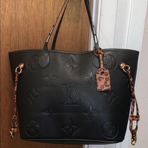 Dupe fashion bag. Brand new, comes with wristlet and dust bag